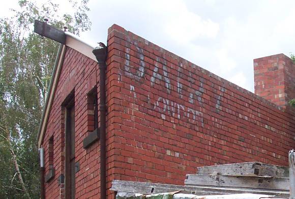 Fading signage - Rear 242 Scotchmer.JPG