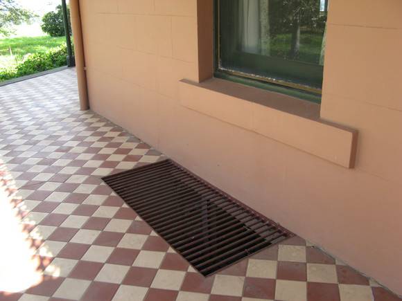 Mt Ridley homestead grill in verandah floor to light cellar