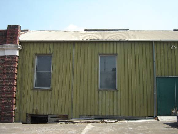 H1343 Exterior - North facade, note sagging roof sheeting.  Dec 2006.