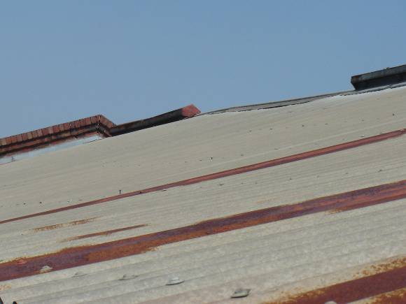 H1343 Existing condition - Roof, looking east, note sagging ridge.  Dec 2006.