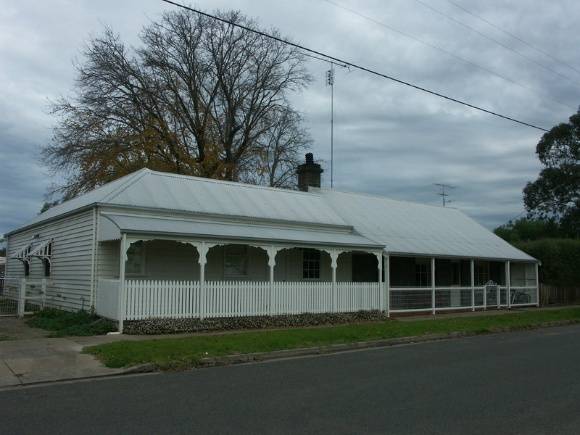 House & Elm tree at rear