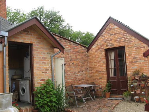 Back entrance and 1862 kitchen