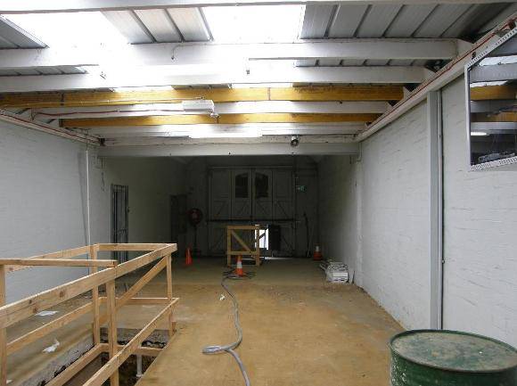 Looking west towards the fire engine room from the space formed by the mid-1950s roofing of the former yard