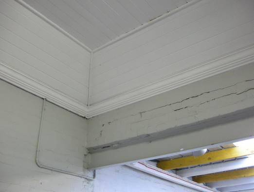 Steel lintel supporting a remnant of the 1896 building's east wall in the north-east corner of the former fire engine room