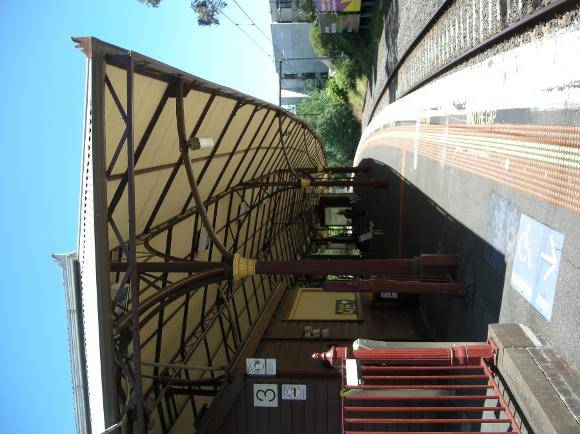 Looking from the north along the edge of Platform 3 - the matching curvature of the canopy roof and platform edge is evident