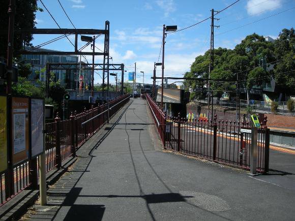 Looking north and upwards along the pedestrian walkway which links the island Platforms 2 and 3 with the south-side footpath on Burwood Rd bridge
