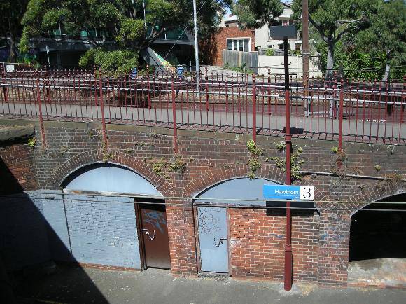The northern-most of the arched alcoves beneath the pedestrian walkway have been enclosed to create storage areas
