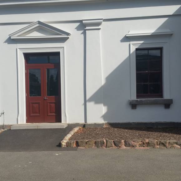 Reconstructed pedimented entry to north side station building refer P20705