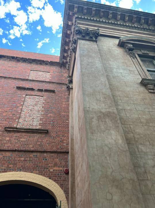 2023. Interface between original building and 1890  extension. 1890 extension was never rendered.