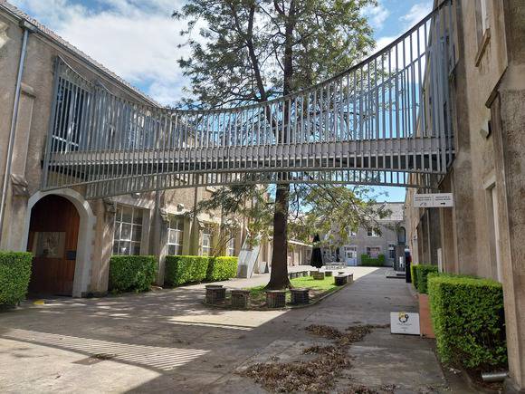 Courtyard of Sacred Heart complex looking north Oct 2024