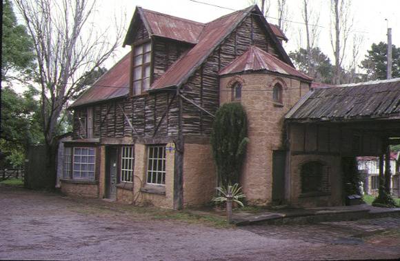 1 montsalvat hillcrest avenue eltham front view stone & wood house