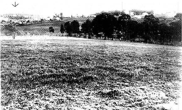 198 - Former Police Complex 728 Main Rd Eltham 03 - Distant view of the Police Residence (furthest left) Showing the complex of buildings on the site then (ELHPC NO. 633) - Shire of Eltham Heritage Study 1992