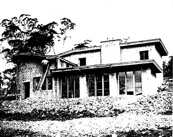 261 - The Busst House Eltham 02 - North elevation of the Busst House photographed during construction - Nore the roof deck above the ground floor living room minus its balustrade which is still to be installed - Shire of Eltham Heritage Study 1992