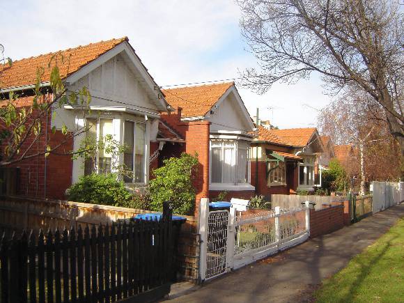 Edwardian semi-detached pairs on the east side of Banole Avenue.