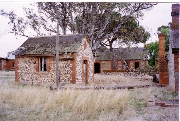 SW 02b - pebble wall outbuildings.