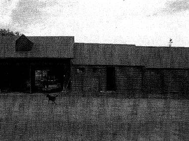 cart shed (altered) and stable complex to right